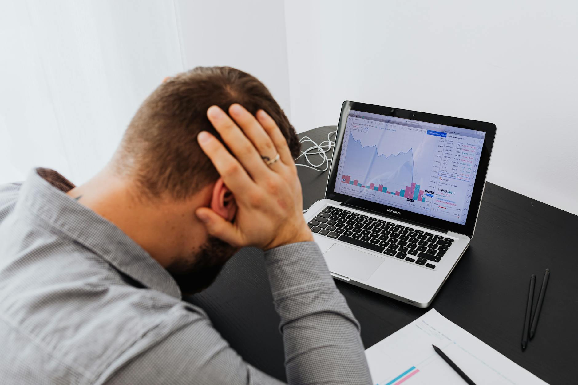 Export manager looking at LinkedIn analytics on a laptop