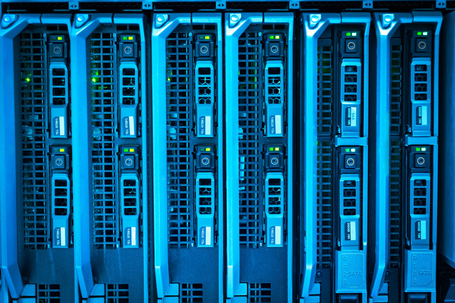 Rows of high-performance server racks in a green-lit data center, highlighting massive data storage infrastructure, professional photography